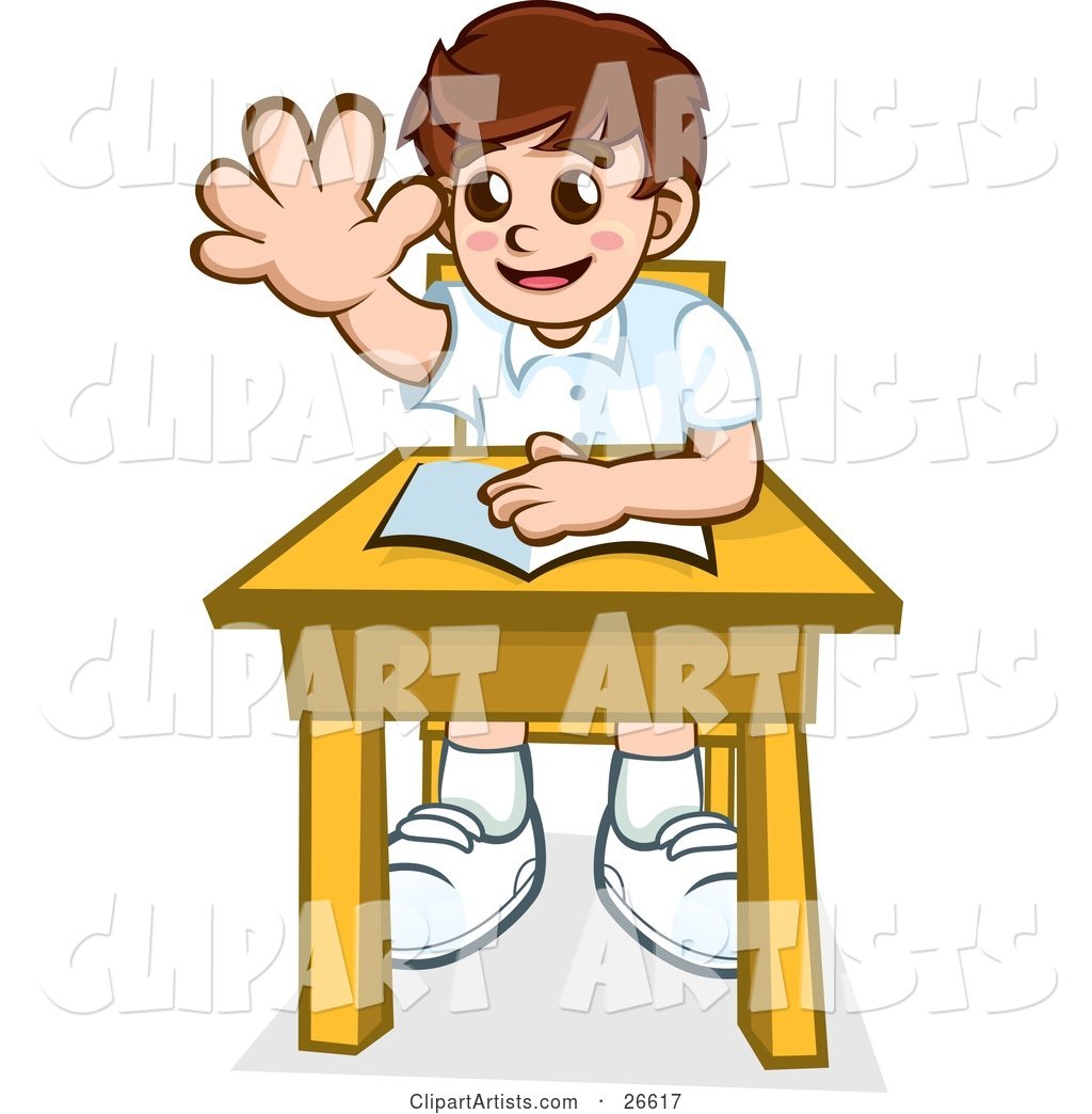 Little School Boy Sitting at His Desk with a Book and Raising His Hand to Ask or Answer a Question