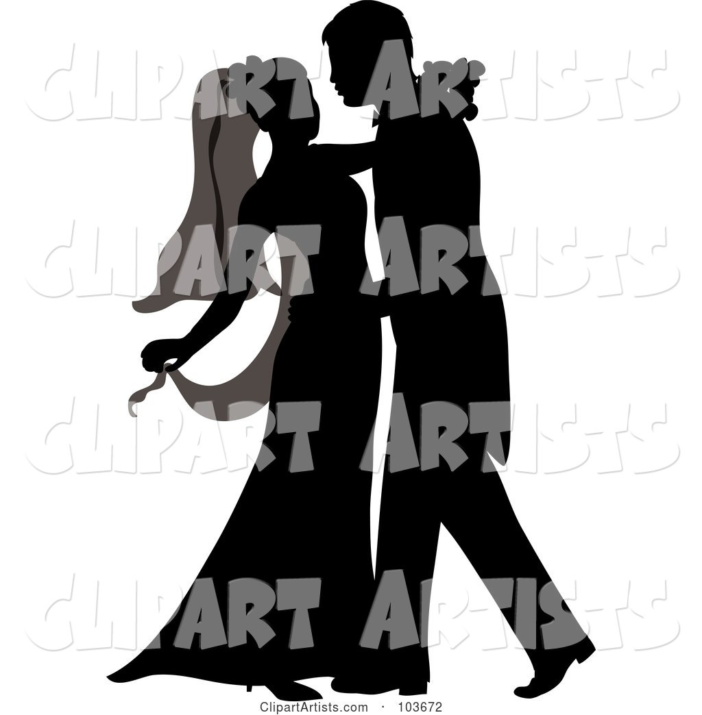 Silhouetted Newlywed Couple Dancing at Their Wedding