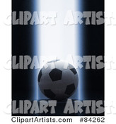 Bright Beam of Light Shining down on a Soccer Ball