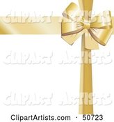 Gold Ribbon and Bow Around a White Gift