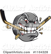 Aggressive Hockey Puck Biting and Snapping a Stick