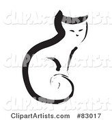 Black Painted Cat Sitting Upright with Its Tail Curled to Its Body