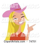 Blond Western Cowgirl Wearing a Pink Hat and Pointing Her Hand like a Gun