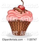 Cupcake with Pink Frosting Chocolate Syrup and a Cherry