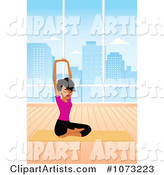 Fit Black Woman in a Studio Doing a Seated Yoga Pose