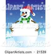 Friendly Smiling Snowman in a Green Scarf and Santa Hat, Holding up a Blank White Sign with His Stick Arms
