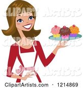 Happy Baker Woman Holding a Tray of Cupcakes