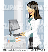 Happy Brunette Pharmacist Using a Computer