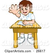 Little School Boy Sitting at His Desk with a Book and Raising His Hand to Ask or Answer a Question