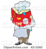 Male Chef Reading a Cook Book