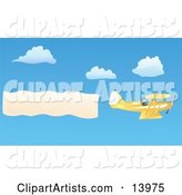 Pilot Flying a Yellow Biplane with a Plane Banner over a Blue Sky with White Puffy Clouds