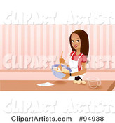 Pretty Brunette Woman Mixing Cake Mix in a Bowl