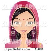 Pretty Indian Woman in Pink, Holding Her Hands to Her Chin