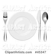 Shiny Plate and Cutlery Set on a Table