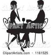 Silhouetted Couple Drinking Wine at a Table