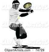 Silhouetted Man Swinging at a Tennis Ball