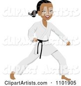 Strong Black or Hispanic Karate Woman with a Black Belt