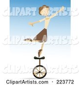 Talented Woman Balancing on One Foot on a Unicycle