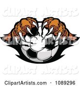 Tiger Mascot Clawing a Soccer Ball