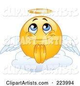 Yellow Emoticon Angel Sitting on a Cloud