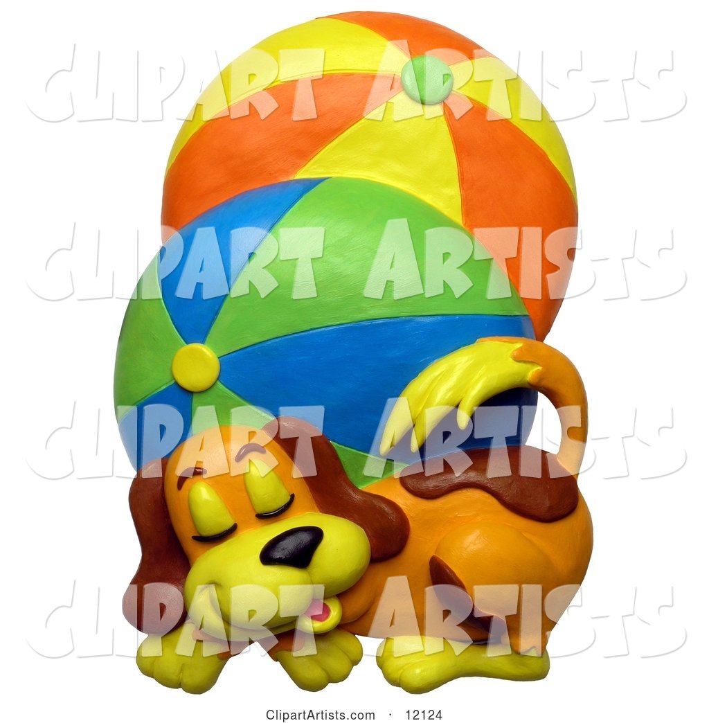 Clay Sculpture of a Cute Puppy Dog Sleeping Next to Two Large Brightly Colored Beach Balls