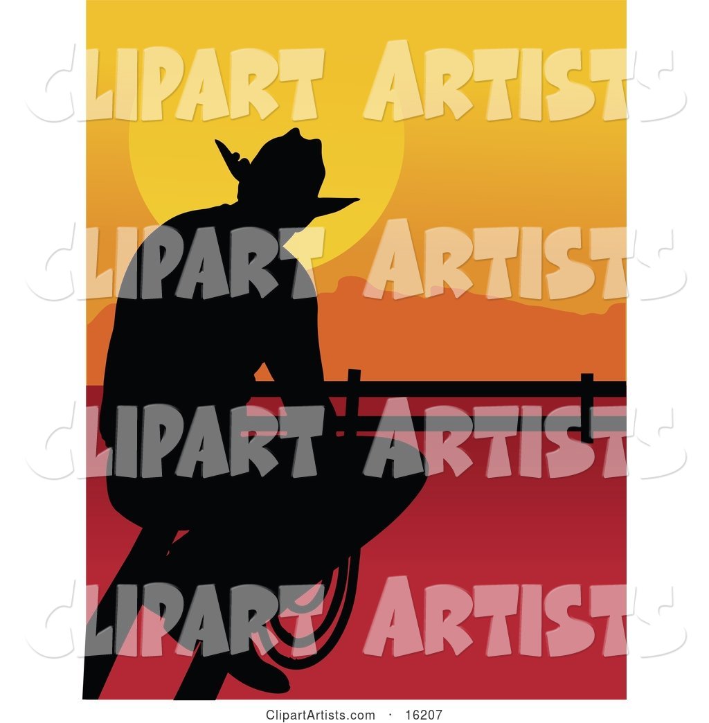 Lonely Cowboy Silhouetted at Sunset, Sitting on a Fence and Holding a Rope While Watching the Sun Go down