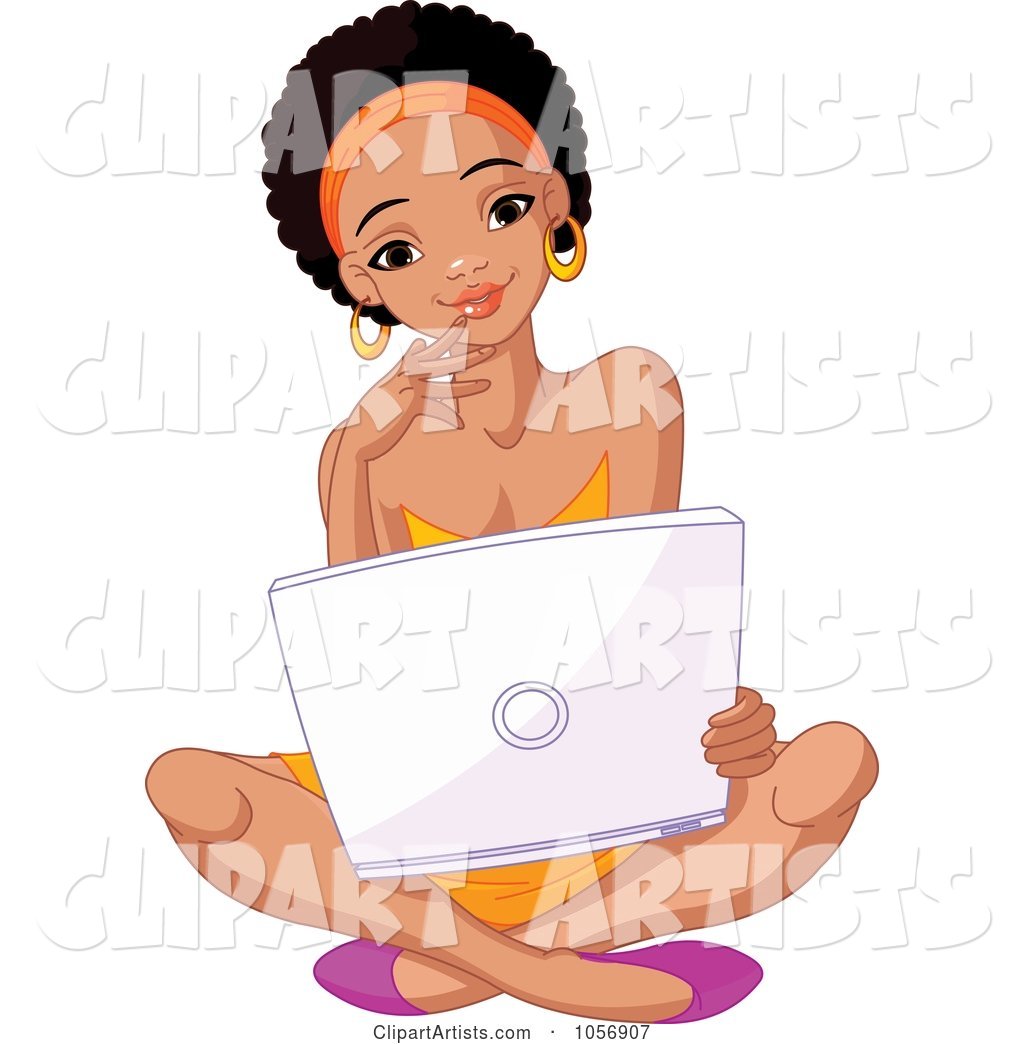 Beautiful Young Black College Student Sitting on the Floor with a Laptop