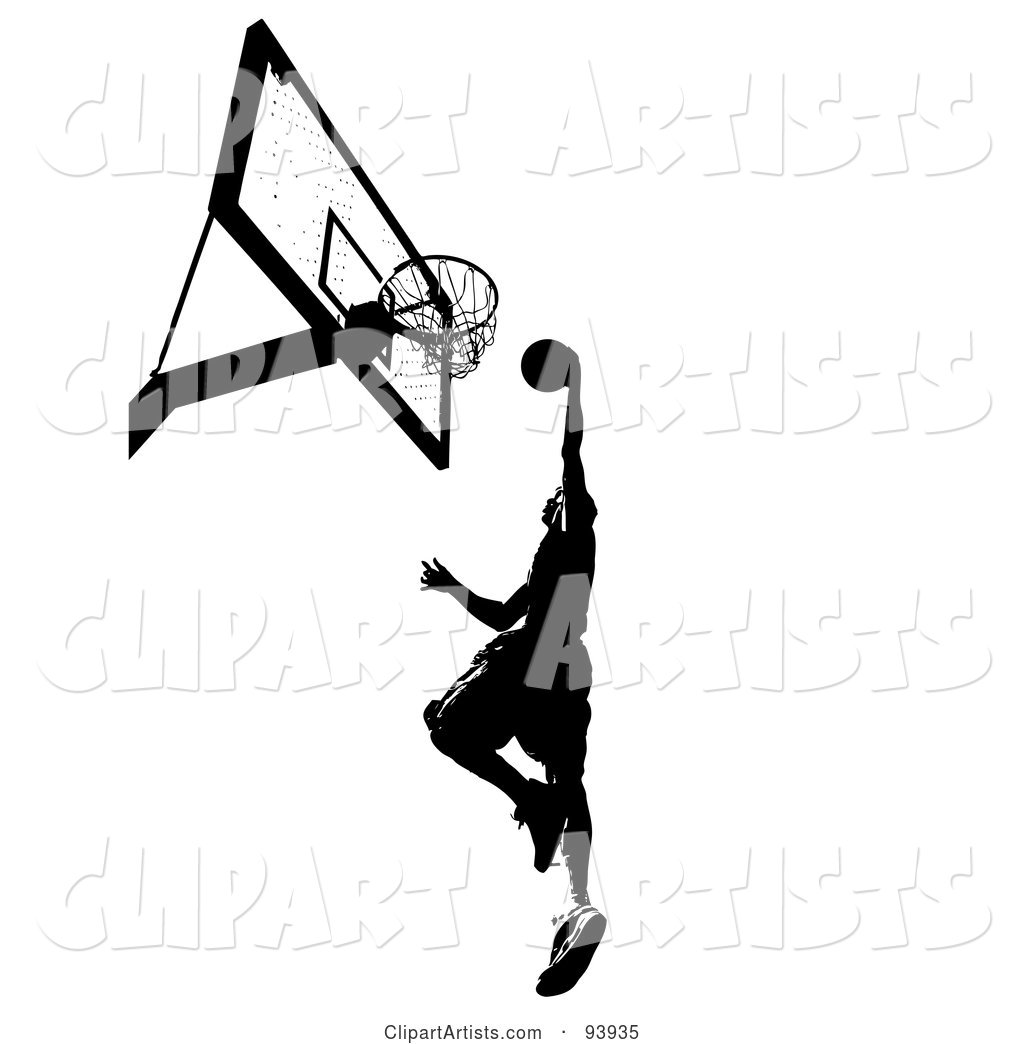 Black Silhouetted Man Leaping Towards a Basketball Hoop