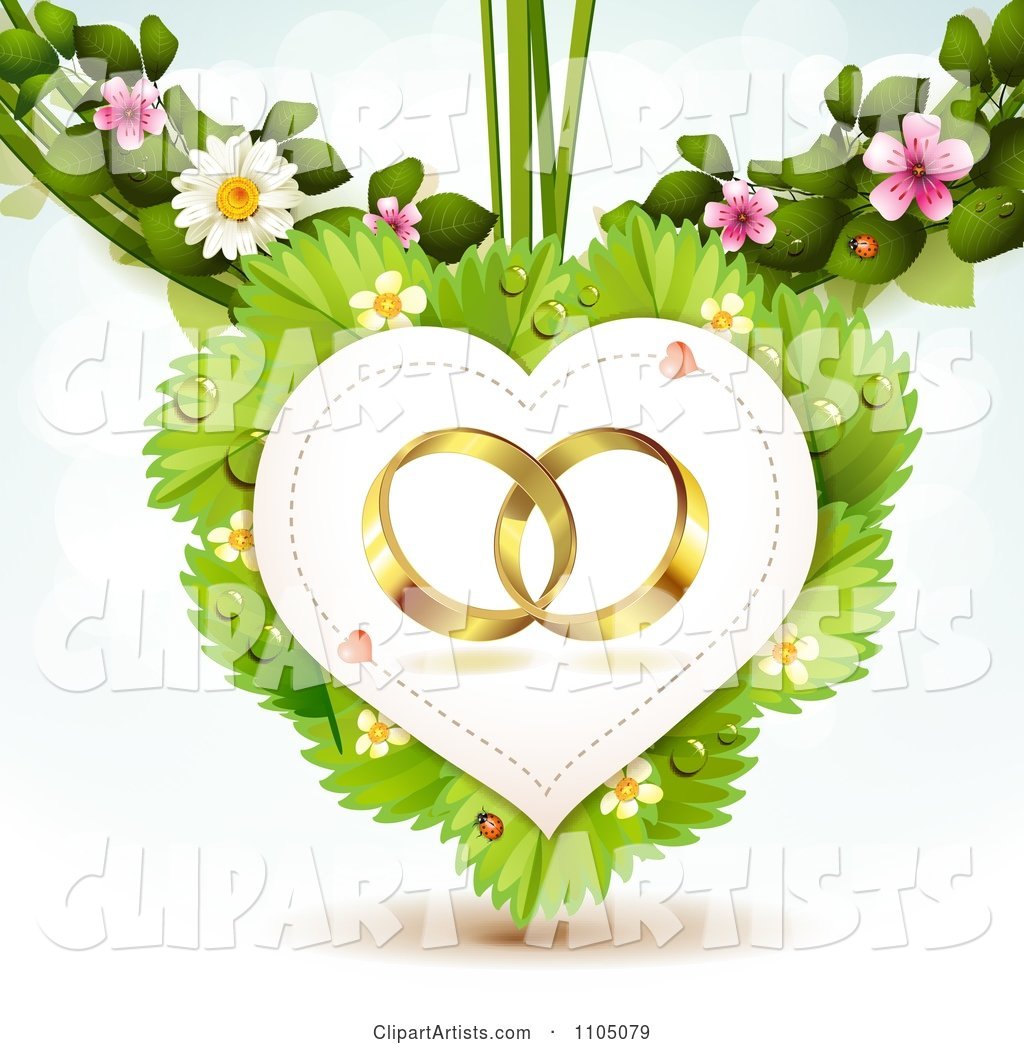 Gold Wedding Rings in a Heart on Leaves with Blossoms