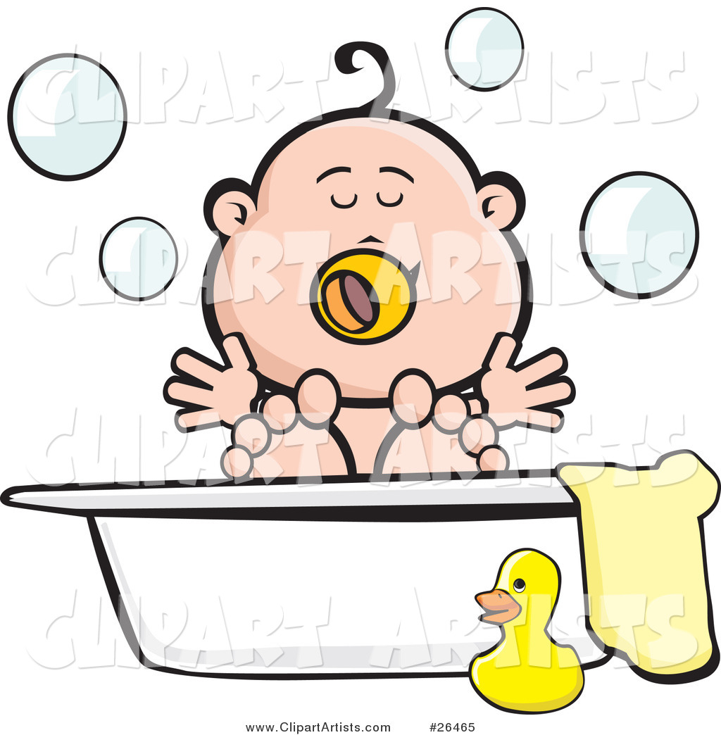 Happy Baby Playing in Bubbles in a Tub with a Towel and Rubber Ducky at the Side