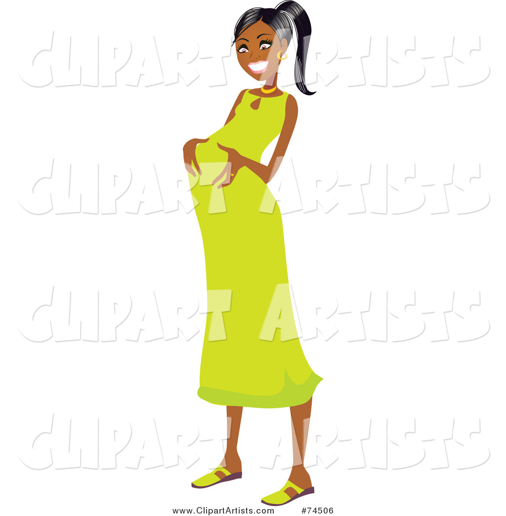 Happy Pregnant Black Woman Rubbing Her Belly in a Green Dress