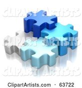 Different Sized Blue and White Puzzle Pieces