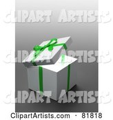 White Gift Box Wrapped with a Green Bow and Ribbons