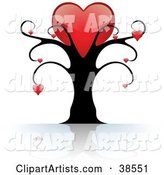 Black Tree with One Large Red Heart on Top and Smaller Hearts Suspended from the Branches