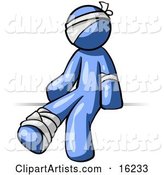 Injured Blue Man Sitting in the Emergency Room After Being Bandaged up on the Head, Arm and Ankle Following an Accident