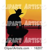 Lonely Cowboy Silhouetted at Sunset, Sitting on a Fence and Holding a Rope While Watching the Sun Go down