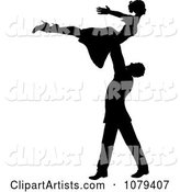 Silhouetted Male Dancer Lifting up His Partner