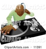 African American DJ Mixing His Records and Listening Through Headphones