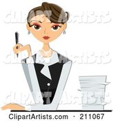 Beautiful Brunette Businesswoman Sitting at a Desk with a Stack of Paperwork