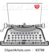 Blank Piece of Paper in a Vintage Typewriter, a Little Red Heart in the Corner