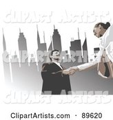 Business Woman and Man Shaking Hands Under Urban Skyscrapers