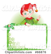 Christmas Elf Standing Behind a Green Blank Sign