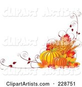Fall Harvest Background of Wheat, Pumpkins, Vines and Autumn Leaves with Copyspace