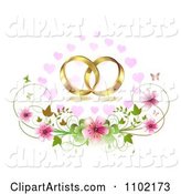 Gold Wedding Bands over Cherry Blossoms Hearts and Butterflies