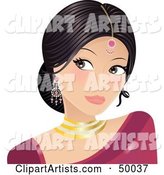 Gorgeous Indian Bride in a Pink Dress, Wearing Jewelery and Looking to the Left