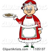 Happy Mrs Claus Holding a Plate of Cookies