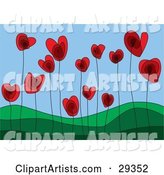 Red Heart Flowers Growing in a Green Hilly Landscape, Symbolizing a Growing Love