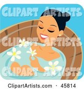Relaxed Woman Soaking in a Bath Treatment with Flowers
