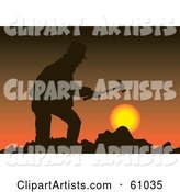 Silhouetted Miner Holding a Hammer Against a Sunset