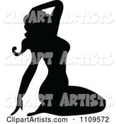 Silhouetted Pinup Woman Sitting on Her Knees